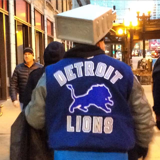 Lions fan wearing cheese grater hats (GIF)