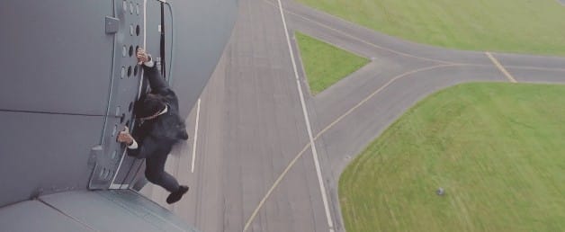 Watch Tom Cruise hang onto the side of a flying plane for Mission: Impossible Rogue Nation