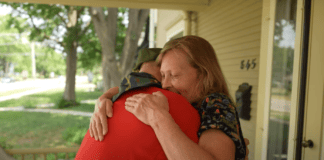 Disabled Marine Corps veteran steps out of his wheelchair and surprises his wife Marine Corps veteran steps out of wheelchair to surprise wife