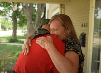 Disabled Marine Corps veteran steps out of his wheelchair and surprises his wife Marine Corps veteran steps out of wheelchair to surprise wife