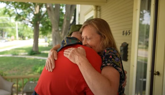 Marine Corps veteran steps out of wheelchair to surprise wife